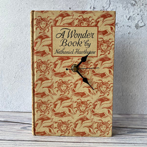 Book clock.  A Wonder Book by Nathaniel Hawthorne.  Medusa.  Pegasus.  Mythology.