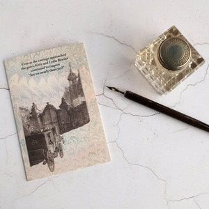 Travel humour card with glass inkwell and dip pen.