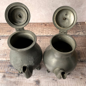 Victorian metal teapots.