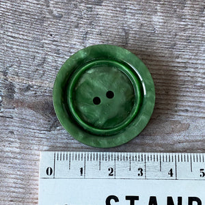 Buttons.  Pair of large vintage green buttons.