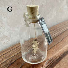 Load image into Gallery viewer, Winnie the Pooh Character in a Bottle.  Miniature glass bottle with original vintage book illustration inside.