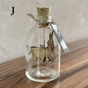 Winnie the Pooh Character in a Bottle.  Miniature glass bottle with original vintage book illustration inside.