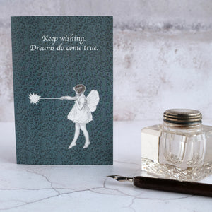 Fairy card and glass inkwell.