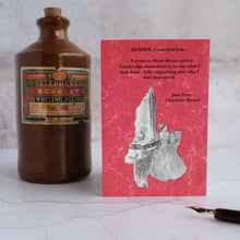 Load image into Gallery viewer, Jane Eyre quotation card beside a stone ink bottle.