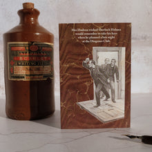 Load image into Gallery viewer, Stone ink bottle and Sherlock Holmes card.